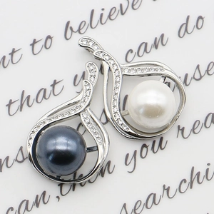 Silver flower pearl pendants with white and black pearls and sparkling zircon accents