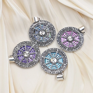Yin Yang Bagua shell pendants in silver plated copper with four pearlescent color options