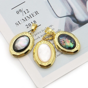 Oval gold locket pendants with abalone and mother of pearl shells in vintage style