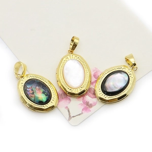 French oval locket pendants with abalone and mother of pearl shells in gold plating