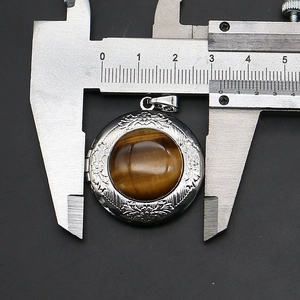 Measurement of 30mm round tiger eye stone locket pendant with floral relief patterns