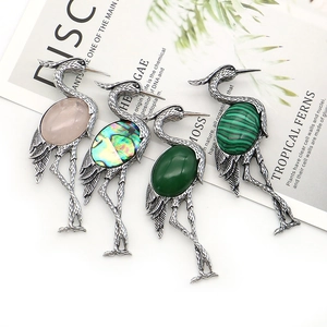 Vintage crane brooches in silver alloy with natural pink stone and colorful shell inlays