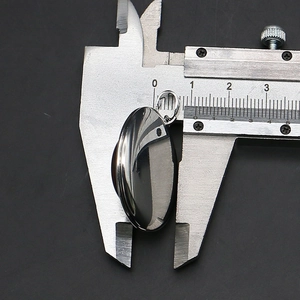 Detailed view showing the 8.5mm thickness of the oval gemstone locket using a caliper