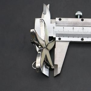 Detailed view of starfish brooch size measuring 30mm with mother of pearl inlay