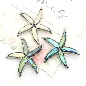 French style starfish brooch set with natural abalone shell inlay on decorative card