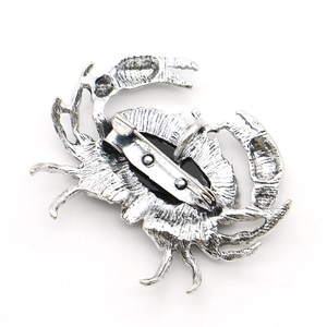 Vintage silver alloy crab brooch with abalone shell detail and secure safety pin back