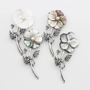 French retro shell flower brooches with natural pearls and vintage silver metal stems