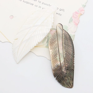 Carved shell feather brooch pendant in pearl white and iridescent black for DIY jewelry