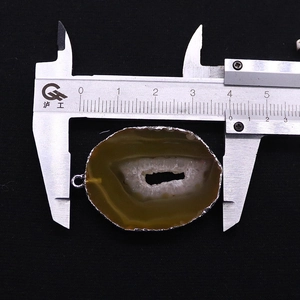 Detailed length measurement of natural agate geode pendant with silver plating
