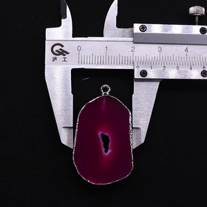 Detailed measurement of magenta agate slice pendant with silver plating showing 2.2cm width