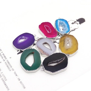 Natural druzy agate slices with silver plated edges in seven vibrant colors for DIY jewelry