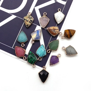 Faceted shield-shaped natural stone pendants with gold-plated edges in various gemstones