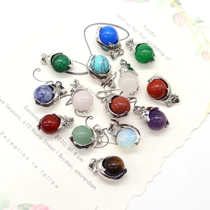 Set of 13 colorful natural stone crystal ball pendants with silver metal frames