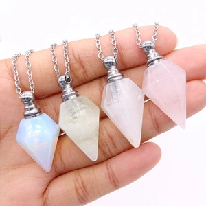 Set of four hexagonal crystal point pendants in opal, citrine, quartz and rose quartz