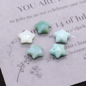 Macro shot of 12mm faceted star-shaped Amazonite beads for DIY jewelry making