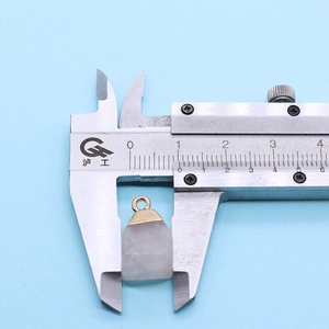 Detailed measurement of natural gemstone pendant width using a digital caliper tool