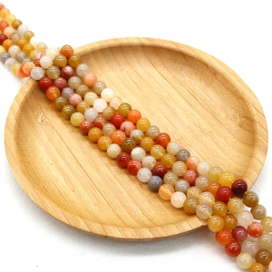 Perles rondes en pierre naturelle 4-10mm pour bijoux DIY dans un bol en bois