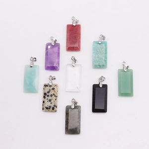 Set of nine rectangular natural stone pendants with polished finish and silver metal clasps