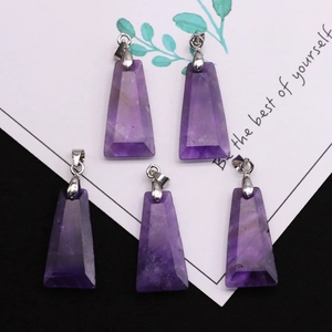 Set of five natural amethyst trapezoid pendants with silver metal loops on a card