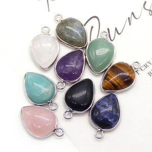 Natural teardrop gemstone pendants in various colors with silver plated metal edges
