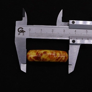 Detailed view of natural imperial stone bridge bead measuring 33mm for jewelry making