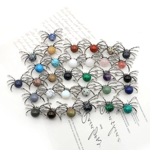 Set of spider-shaped natural stone pendants in various colors with silver metal frames