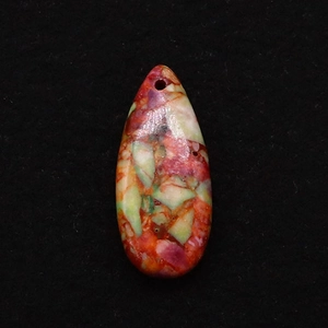 Macro view of teardrop stone pendant with multi-color mosaic pattern and top drill hole