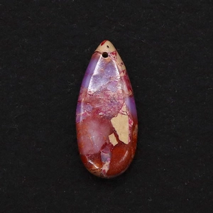 Macro detail of teardrop emperor stone pendant with purple and brown marbled texture