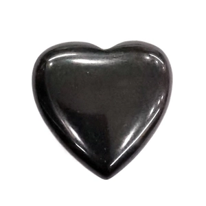 Macro shot of polished heart-shaped black agate stone with glossy finish for DIY jewelry
