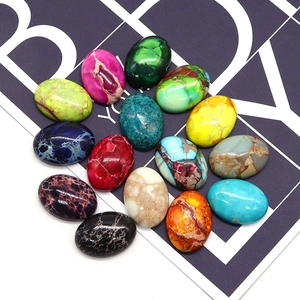 Cabujones óvalos de piedra imperial y turquesa con patrones naturales en varios colores