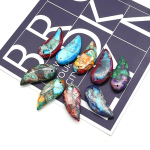 Set of eight colorful crescent natural stone pendants with vivid textures and gold veins