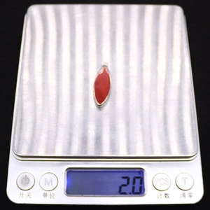 Detail showing natural stone pendant on electronic scale weighing 2.0g for DIY accessories