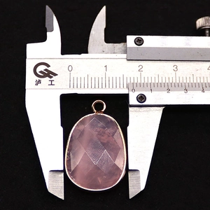 Detailed measurement of faceted pink crystal pendant with gold plating showing 1.8cm width