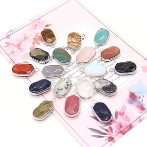 Oval faceted natural stone pendants with silver plated edges in diverse gemstone colors