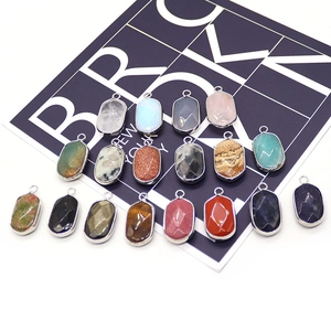 Oval cut natural stone pendants with silver plated edges in diverse gemstone colors