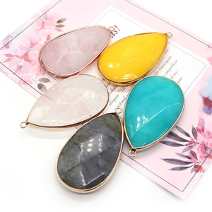 Five assorted faceted teardrop gemstone pendants with rose gold plated metal edges for DIY jewelry