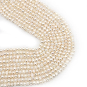Natural white freshwater pearls strands in near-round shape for DIY jewelry making