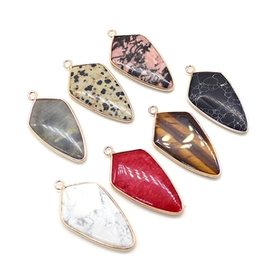 Arrowhead natural stone pendants with gold plated edges in seven assorted mineral colors