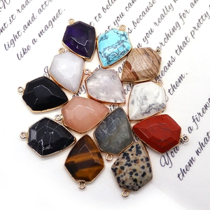 Faceted shield-shaped natural stone pendants with gold plated edges in various colors