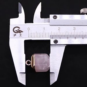 Detailed measurement of a 15mm pink quartz hexagonal pendant with gold metal trim