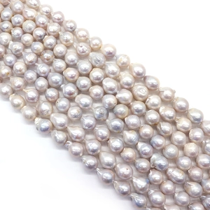 Natural baroque freshwater pearl strands with irregular shapes and a lustrous pinkish white glow