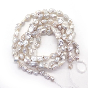 Strand of irregular 8mm Baroque freshwater pearls with pink-purple luster for DIY jewelry
