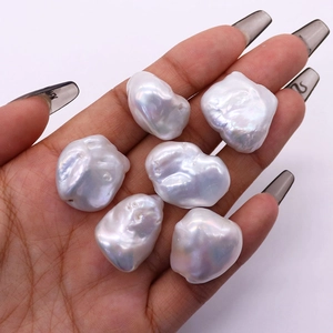 Irregular white baroque freshwater pearls with rainbow luster for DIY jewelry making