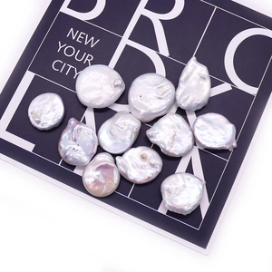 Flat 20mm baroque freshwater pearl loose beads for DIY jewelry making on modern background