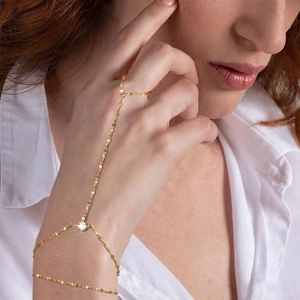 Goldenes zweilagiges Blattketten Fingerarmband mit funkelndem runden Zirkonstein Besatz