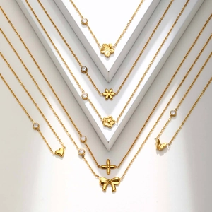 Goldene Edelstahlketten Set mit Herz-, Schmetterlings- und Zirkonia-Anhängern