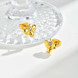Exquisite goldene Bienenohrstecker aus Edelstahl mit funkelnden weißen Zirkonia-Steinen