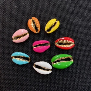 Colorful natural cowrie shells with gold plated edges for DIY jewelry making and design