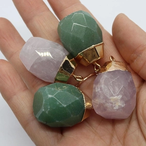 Faceted natural stone pendants in rose quartz and green aventurine with gold metal caps