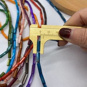 Détails de perles cylindriques en nacre de 4 mm pour la création de bijoux DIY